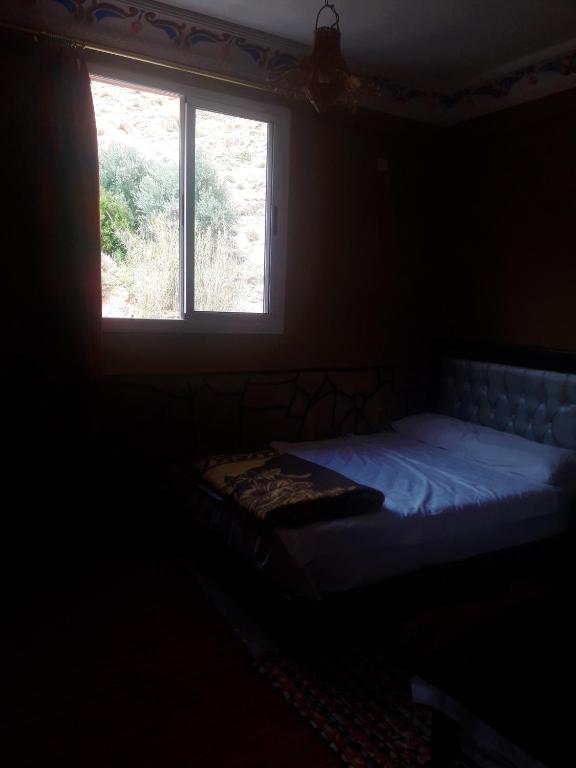 Postel nebo postele na pokoji v ubytování Dounia Hostel