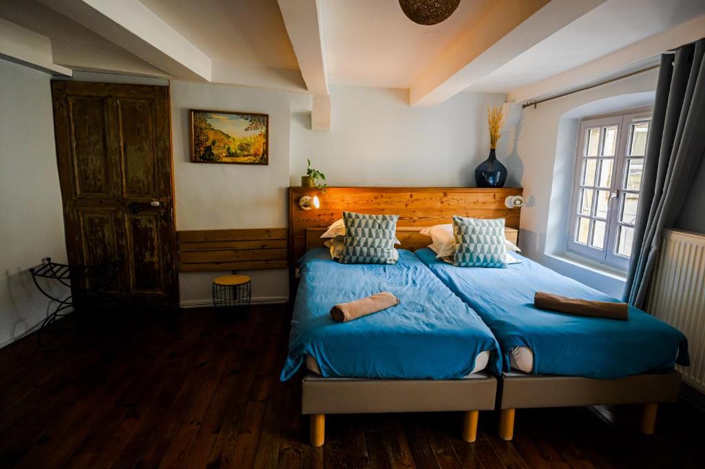 Postel nebo postele na pokoji v ubytování Gîte le pied du géant - Local sécurisé pour les vélos