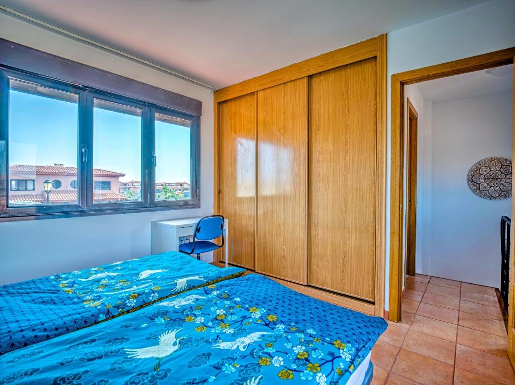A bed or beds in a room at Villa Origo Mare 1236 in Majanicho
