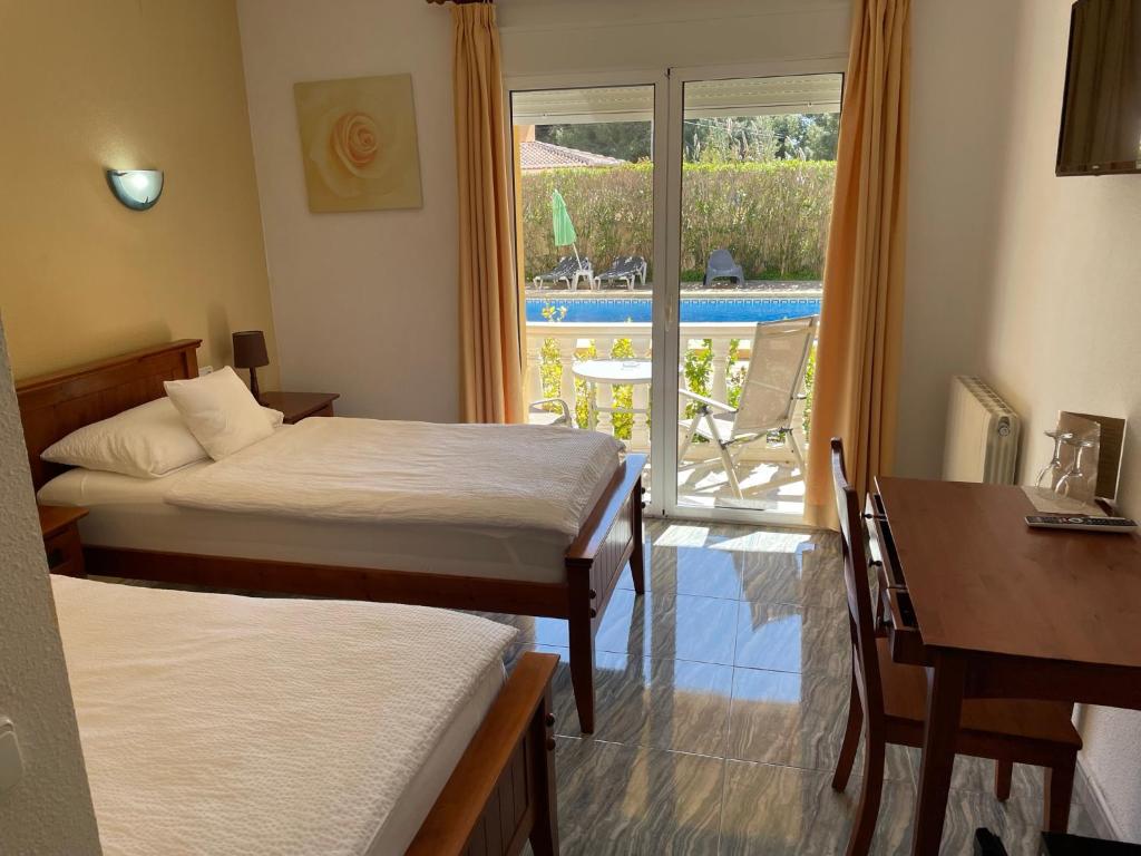 Postel nebo postele na pokoji v ubytování Hotel Montemar