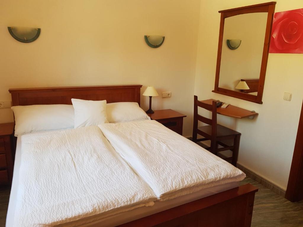 Postel nebo postele na pokoji v ubytování Hotel Montemar