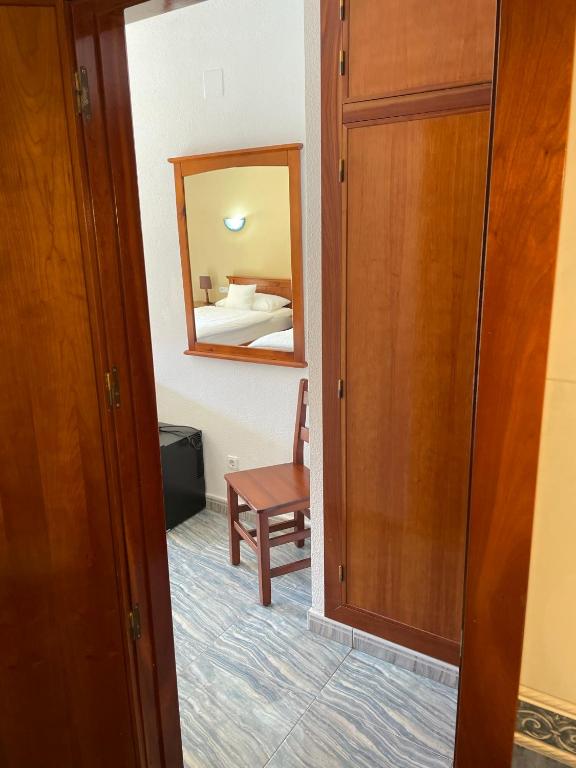Postel nebo postele na pokoji v ubytování Hotel Montemar