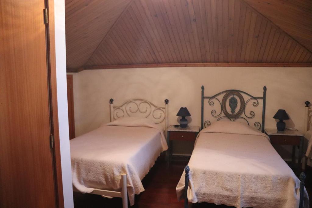 Postel nebo postele na pokoji v ubytování Casa do Destro Guest House