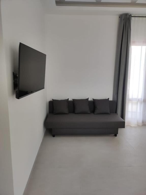 TV a/nebo společenská místnost v ubytování Villa Rita Apartament & Rooms