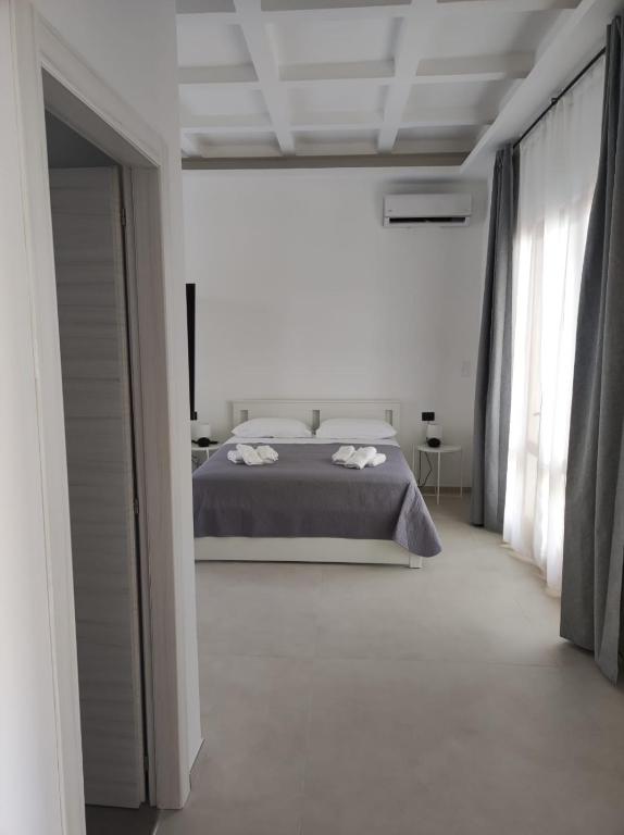 Postel nebo postele na pokoji v ubytování Villa Rita Apartament & Rooms