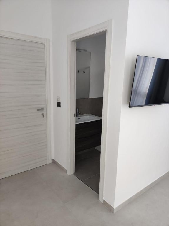 TV a/nebo společenská místnost v ubytování Villa Rita Apartament & Rooms