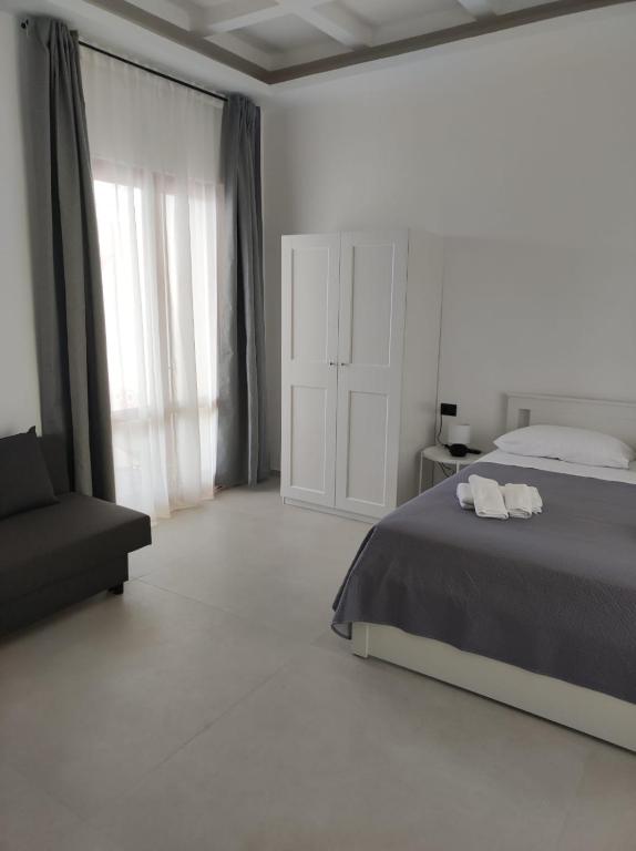 Postel nebo postele na pokoji v ubytování Villa Rita Apartament & Rooms