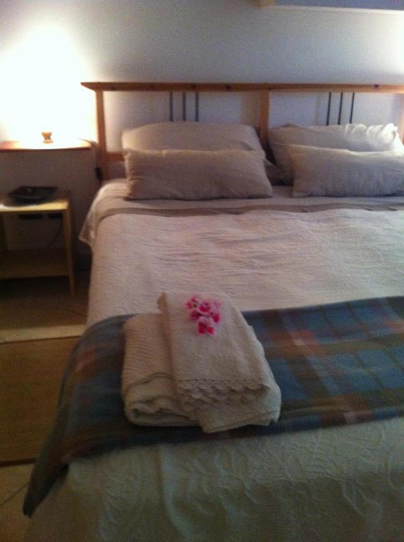 Postel nebo postele na pokoji v ubytování B&B Il Portico del Conte