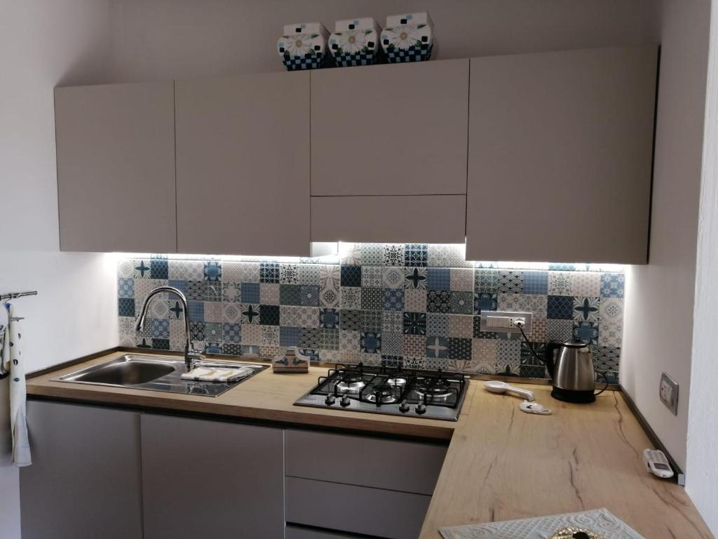 Küche/Küchenzeile in der Unterkunft casa con terrazza
