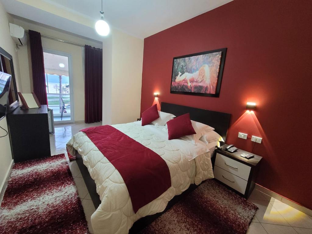 Postel nebo postele na pokoji v ubytování Haris Hotel