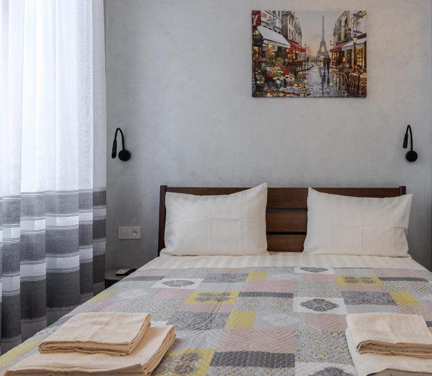 Ένα ή περισσότερα κρεβάτια σε δωμάτιο στο Golden Violin ! Apartments Lviv T