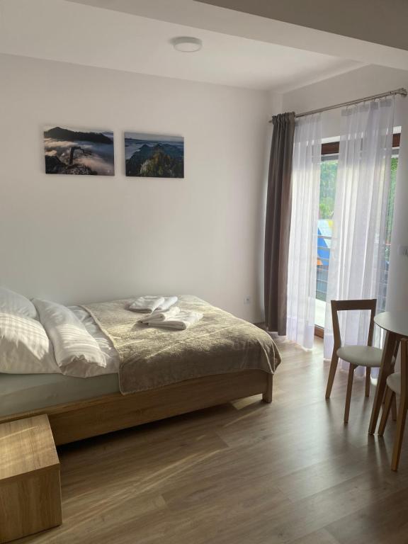 Postel nebo postele na pokoji v ubytování W Pieninach pokoje
