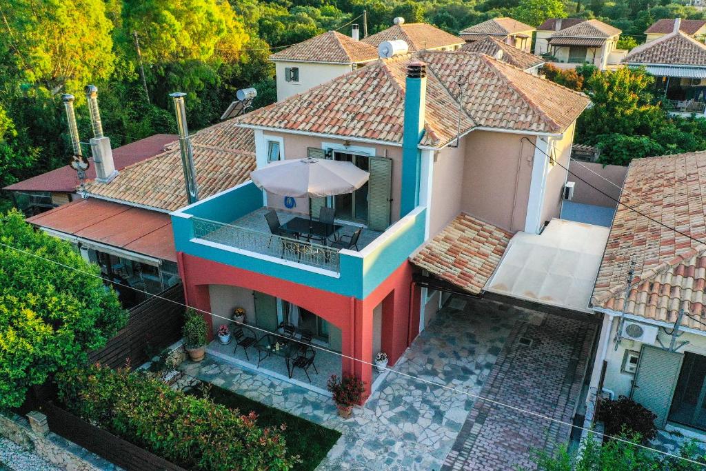 an aerial view of a house with a balcony at Saint Georgio Castle View Villa in Argostoli