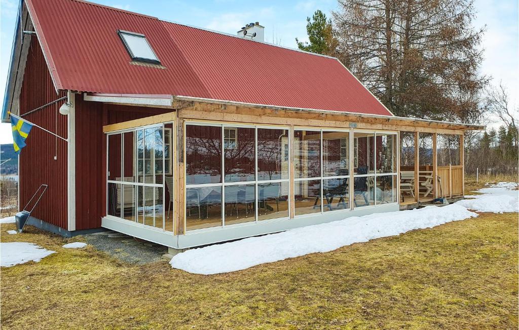 a large red barn with a red roof at Beautiful Home In Erikslund With 2 Bedrooms in Erikslund