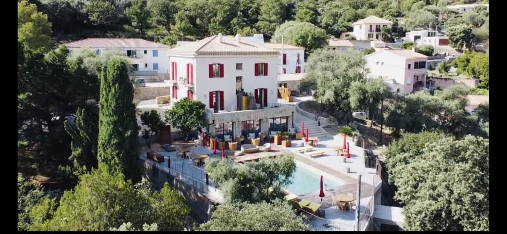 an aerial view of a city with a building at Hôtel Casale Olmia 