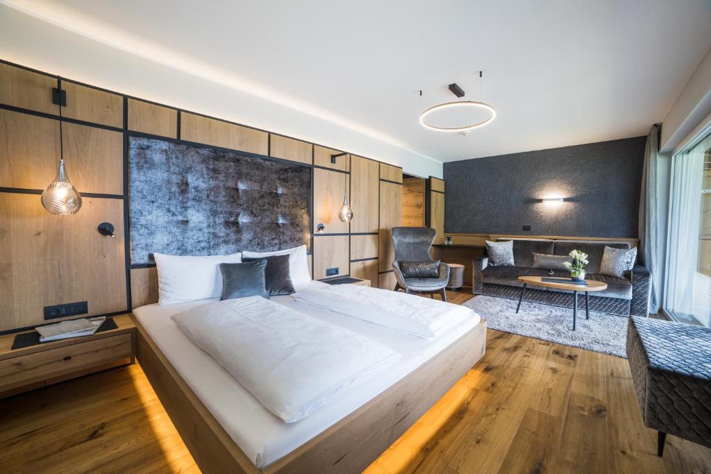 Ein Bett oder Betten in einem Zimmer der Unterkunft Hotel Panorama