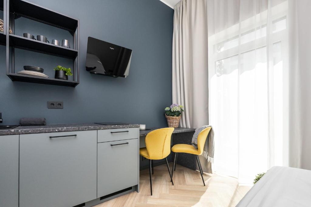 Kuchyň nebo kuchyňský kout v ubytování Rare Apartments - Self Check-In Miniapartments