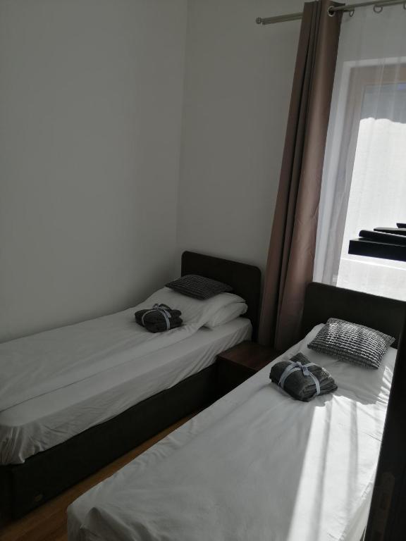 Een bed of bedden in een kamer bij Divčinova1 Reset A2