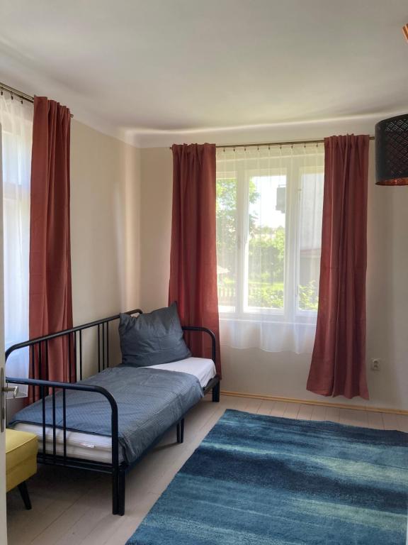 Postel nebo postele na pokoji v ubytování Apartmány Chmelničky