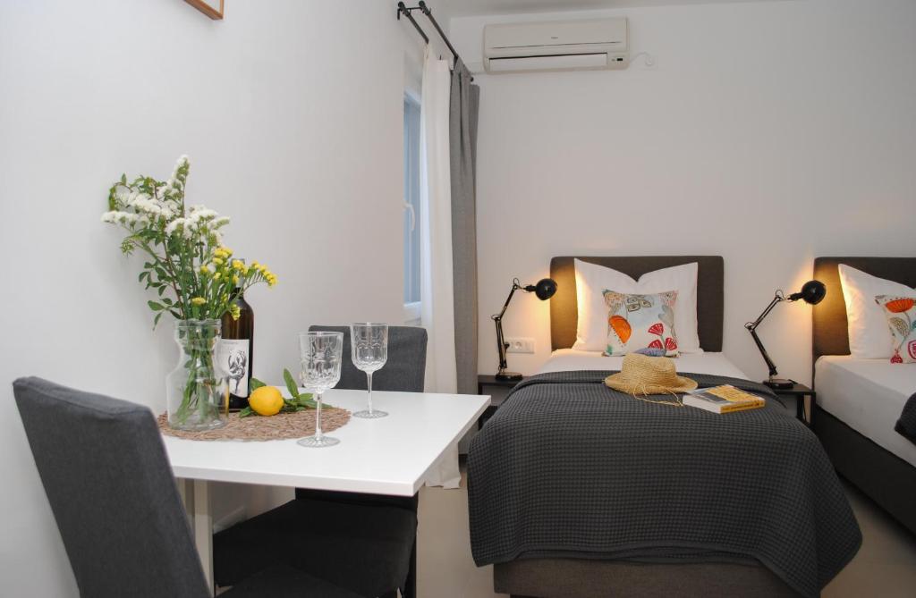 Postel nebo postele na pokoji v ubytování Rooms Dilk