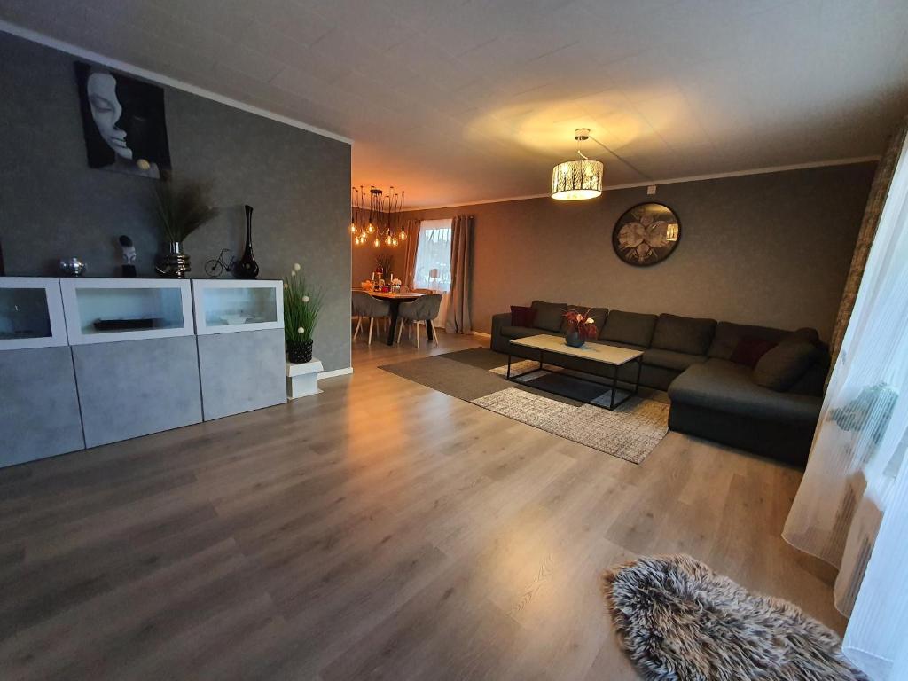 Posezení v ubytování Villa for 10 persons with massage chair, sauna, billiard table and free electric vehicle station for electric cars