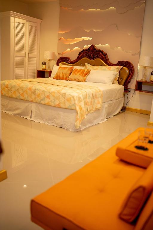 Кровать или кровати в номере Escappé Suites