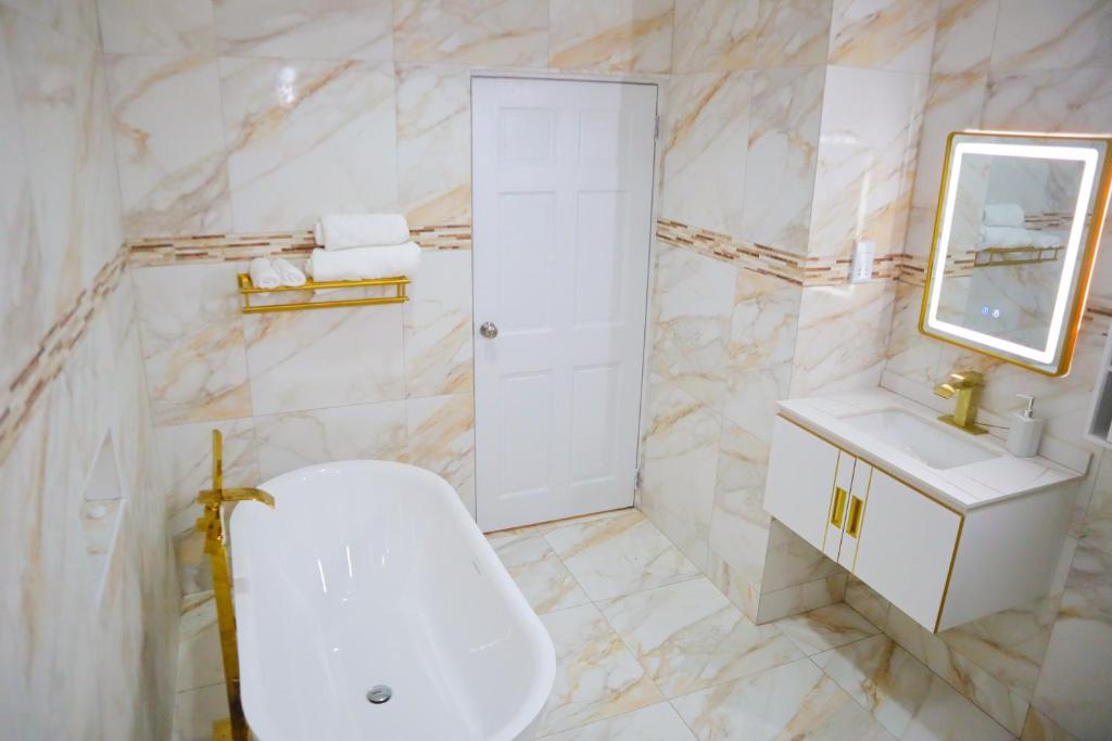 Ванная комната в Escappé Suites