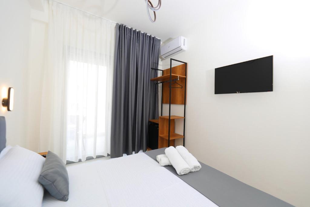 Postel nebo postele na pokoji v ubytování Maor Hotel