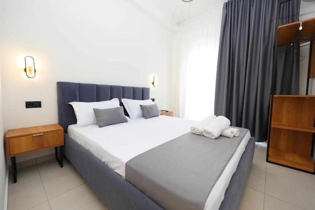 Postel nebo postele na pokoji v ubytování Maor Hotel