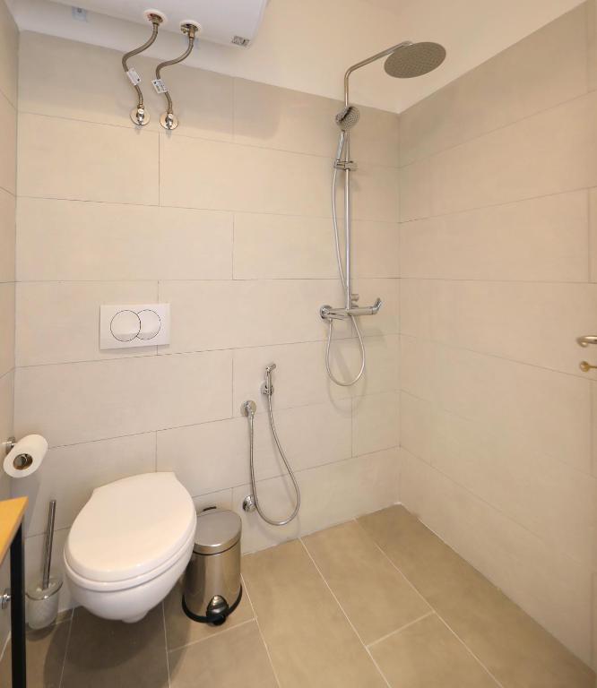 Koupelna v ubytování Maor Hotel