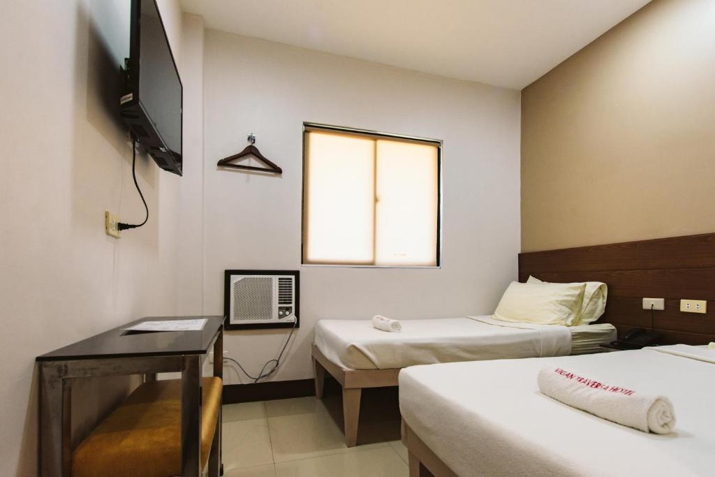 TV a/nebo společenská místnost v ubytování Vigan Traversa Hotel