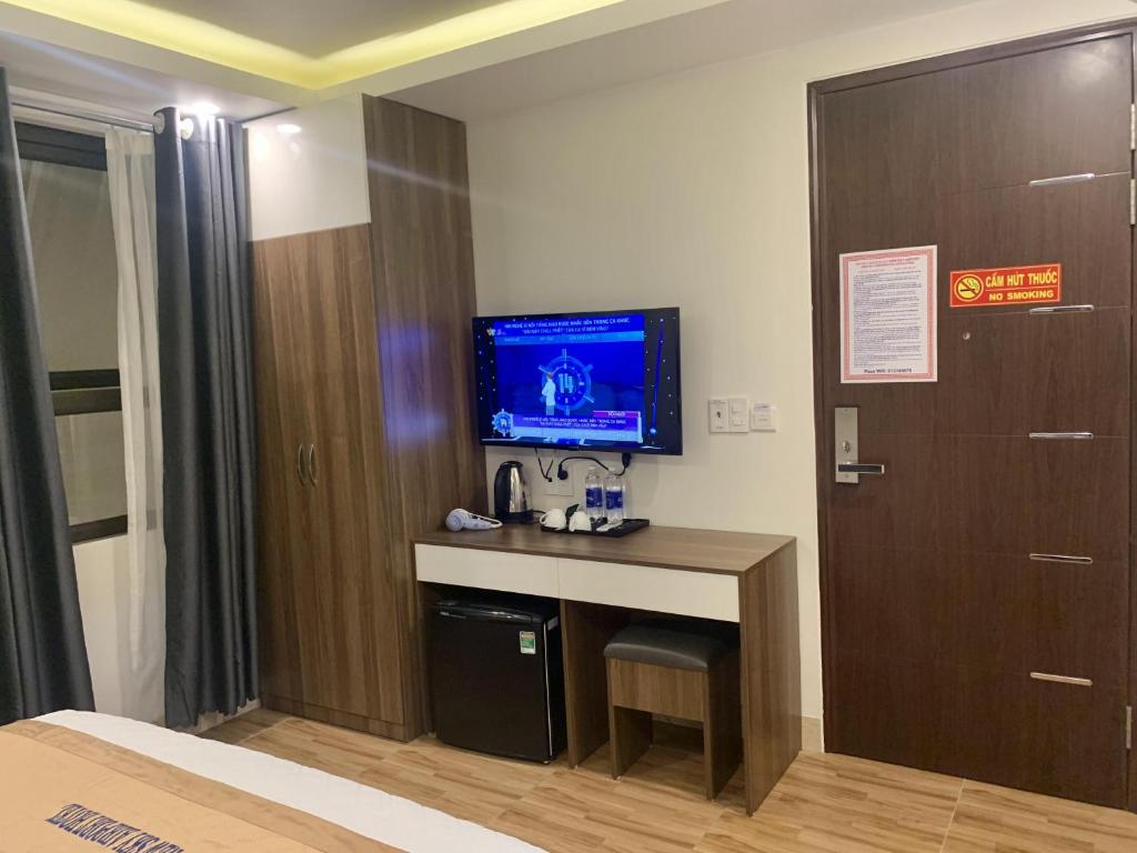 TV a/nebo společenská místnost v ubytování NEW SKY AIRPORT HOTEL NỘI BÀI