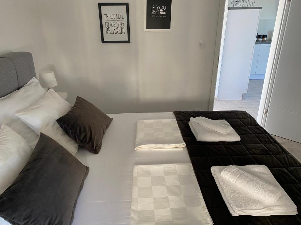 Postel nebo postele na pokoji v ubytování Ada Vis Apartments