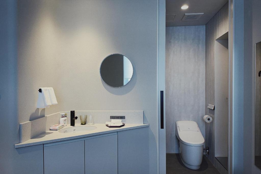 Koupelna v ubytování Hotel Rakuragu