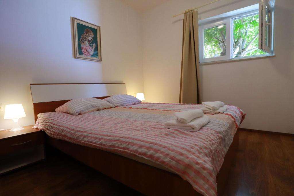 Postel nebo postele na pokoji v ubytování Accommodation Salvia