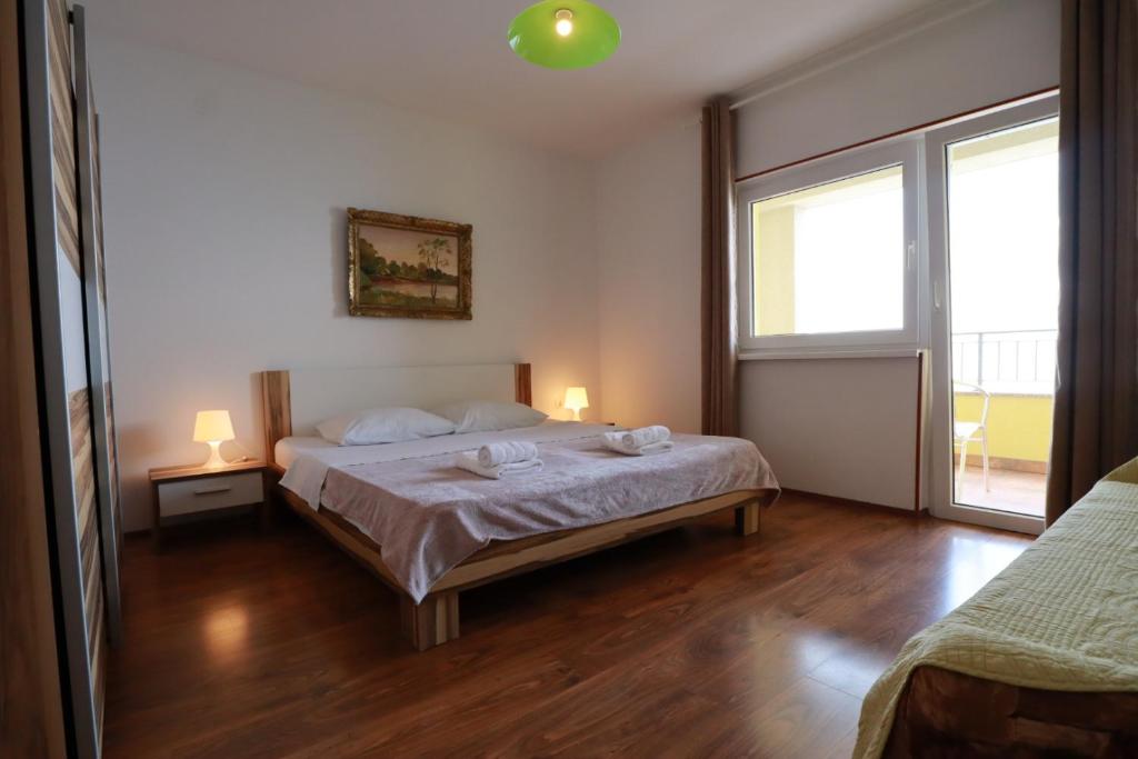 Postel nebo postele na pokoji v ubytování Accommodation Salvia