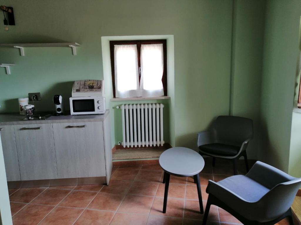 Kuchyň nebo kuchyňský kout v ubytování SPELLO ROMANTICA