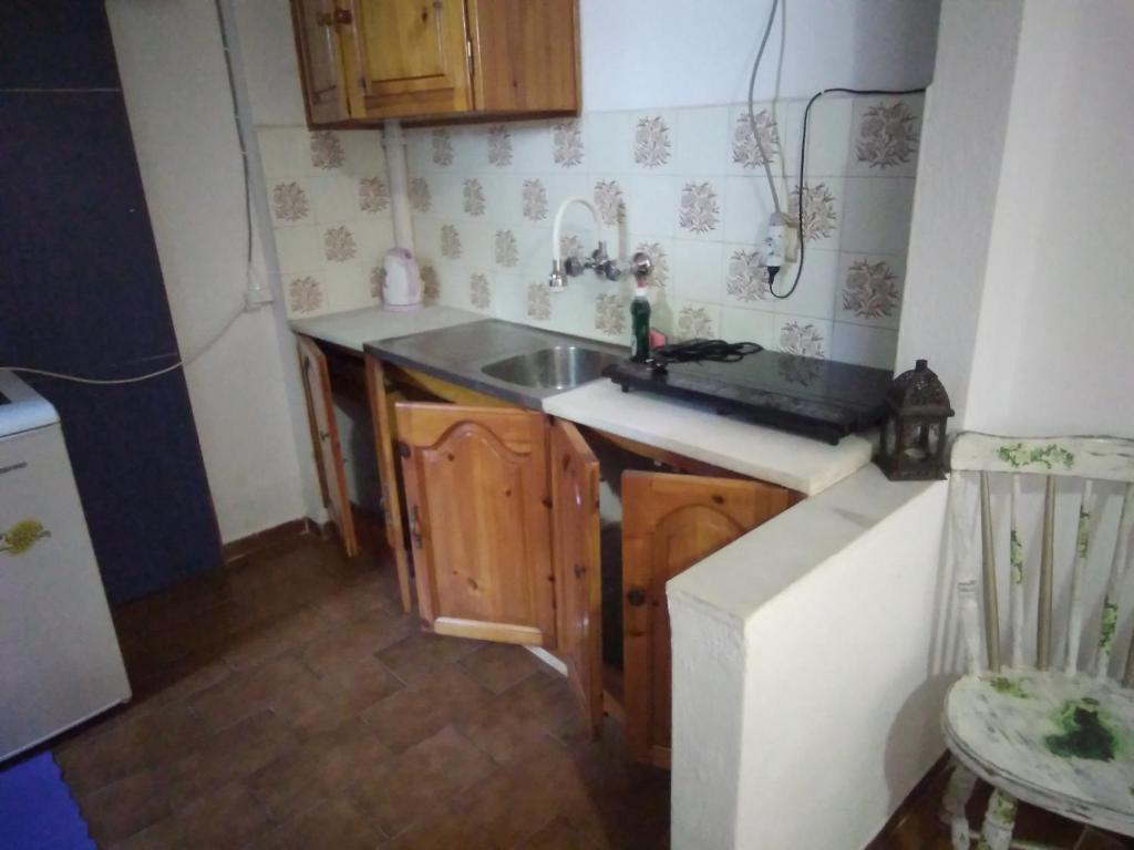 Kuchyň nebo kuchyňský kout v ubytování Villa Ourania