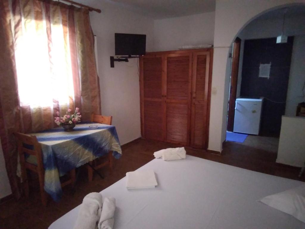 Postel nebo postele na pokoji v ubytování Villa Ourania