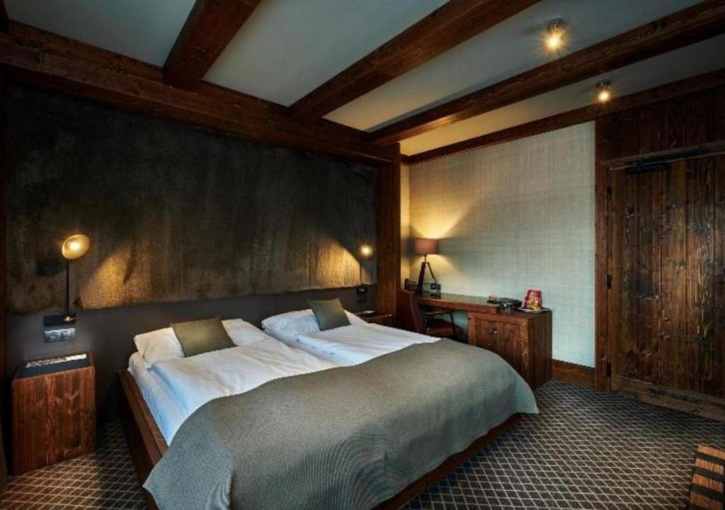 Postel nebo postele na pokoji v ubytování Hotel Pošta