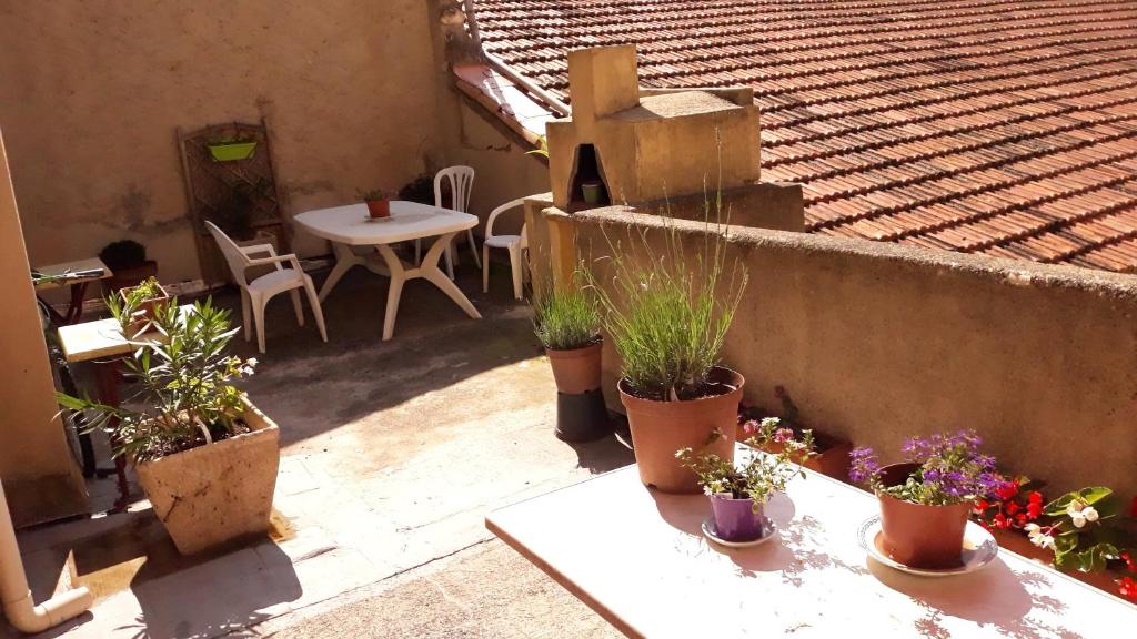 Balkón nebo terasa v ubytování Hôtel Du Cours