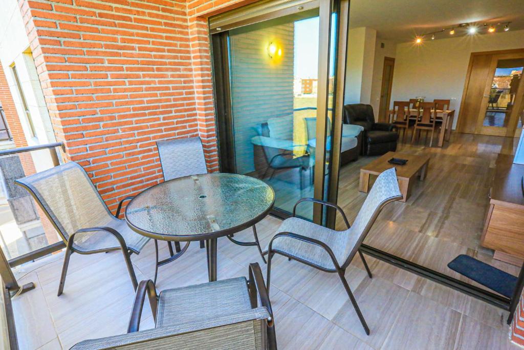A seating area at LITORAL COSTA DORADA - ESQUIROL Only families
