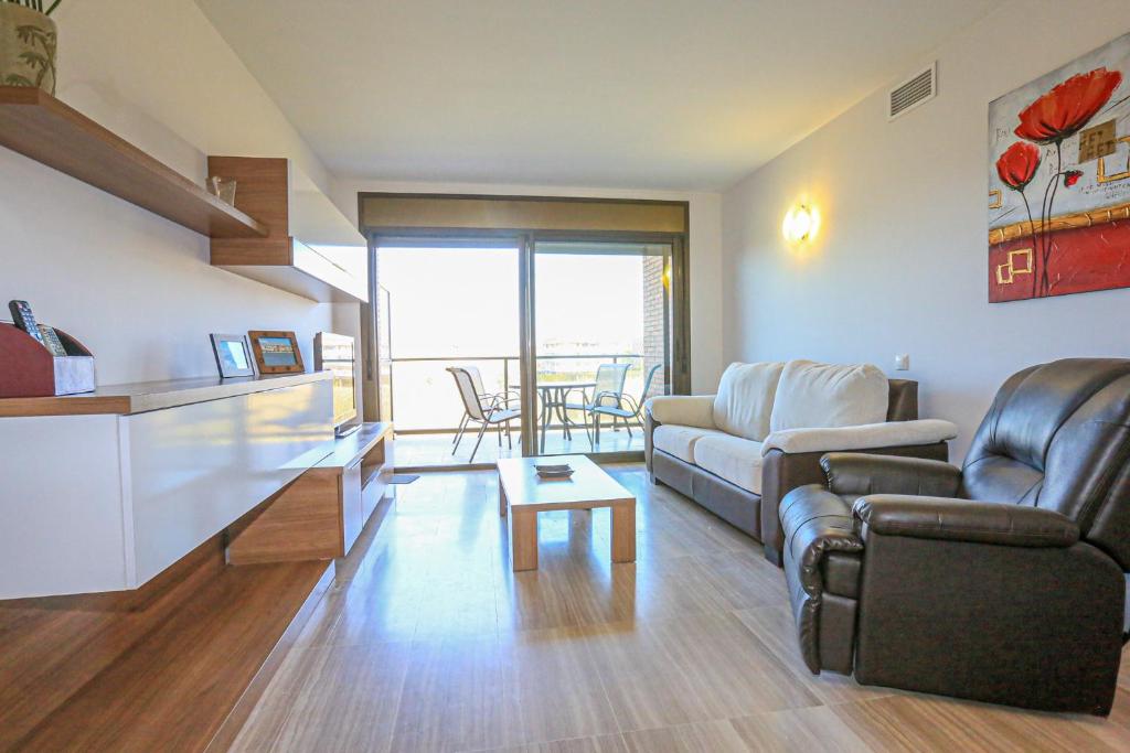 A seating area at LITORAL COSTA DORADA - ESQUIROL Only families