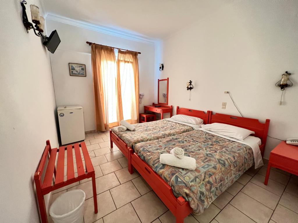Postel nebo postele na pokoji v ubytování Asterias Hotel - Seafront
