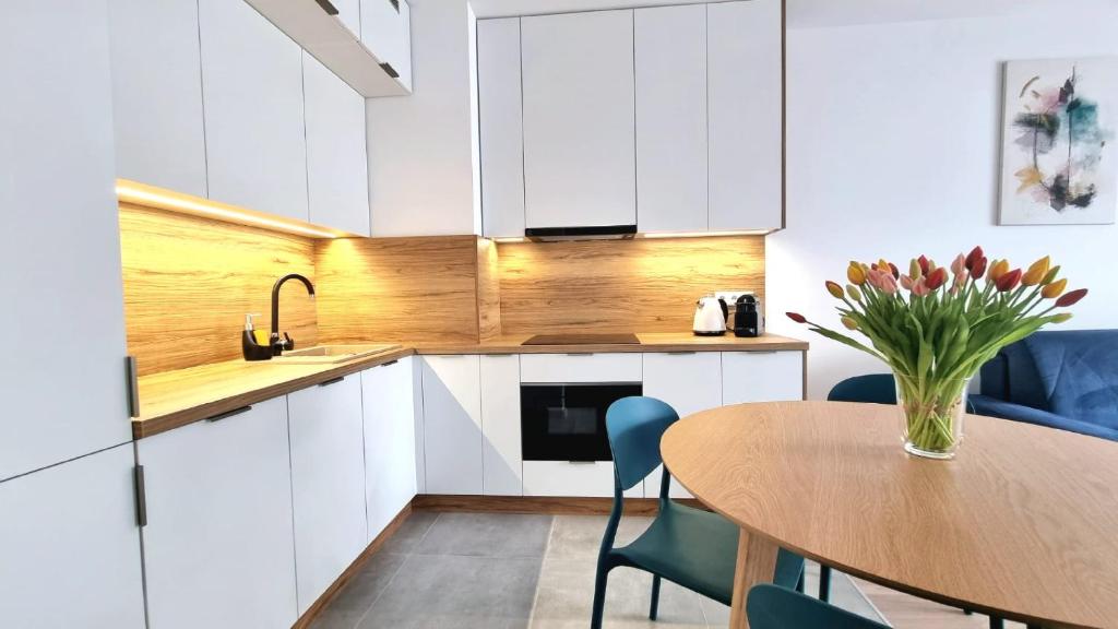 Kuchyňa alebo kuchynka v ubytovaní NOOK NOOK Apartments Bytkowska 103