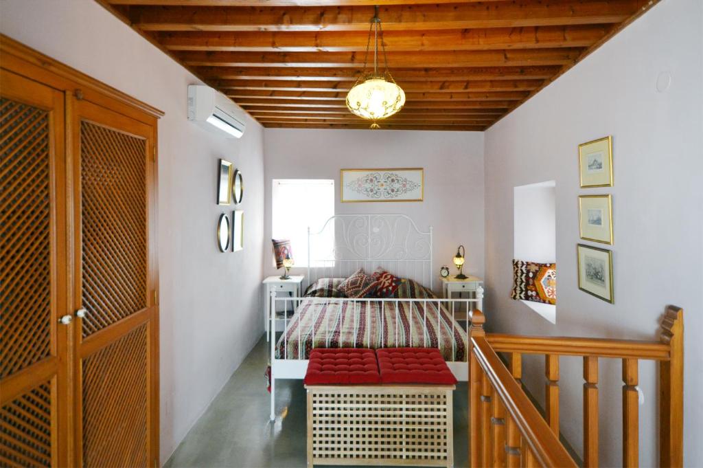 Postel nebo postele na pokoji v ubytování Casa Lindos