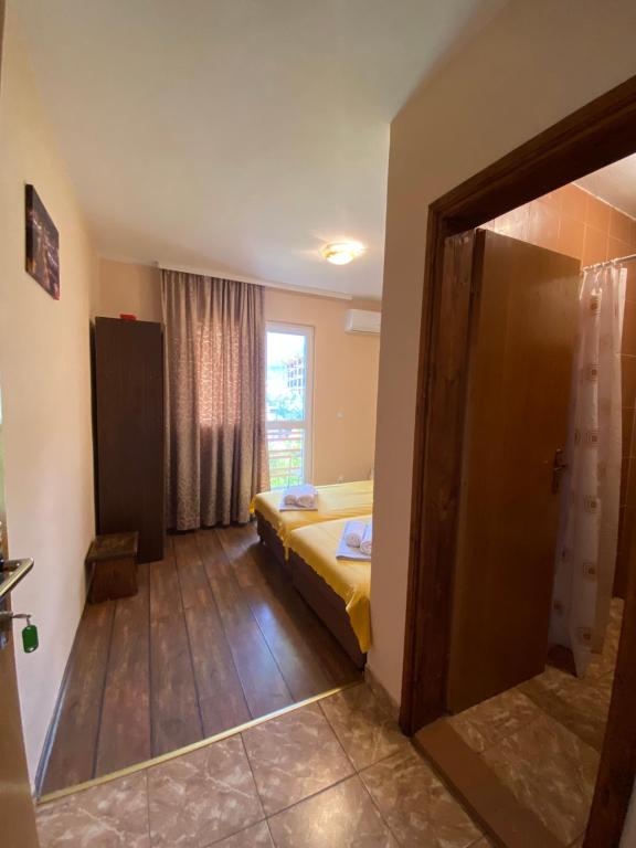 Postel nebo postele na pokoji v ubytování Apartments and Rooms Grande Casa