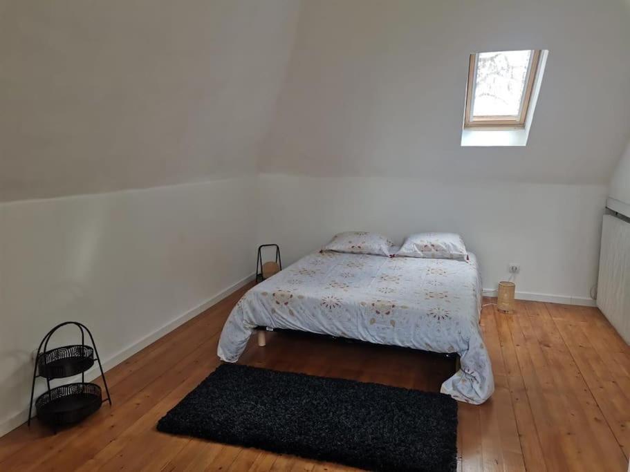 Ένα ή περισσότερα κρεβάτια σε δωμάτιο στο Happiness, maison de charme à 20mn centre ville de Amiens
