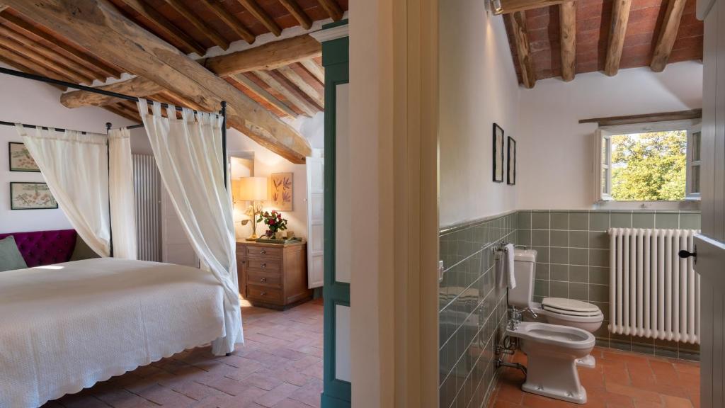 A bed or beds in a room at ANTICIANA 8, Emma Villas