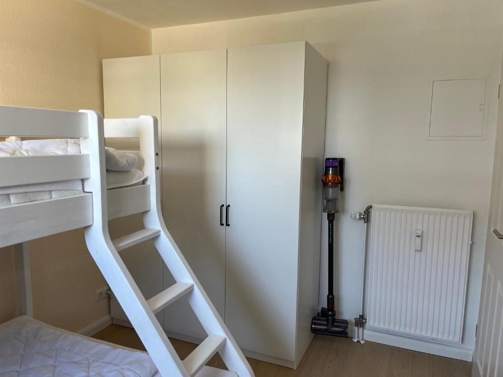 Postel nebo postele na pokoji v ubytování Haus Titania Wohnung Meerblick